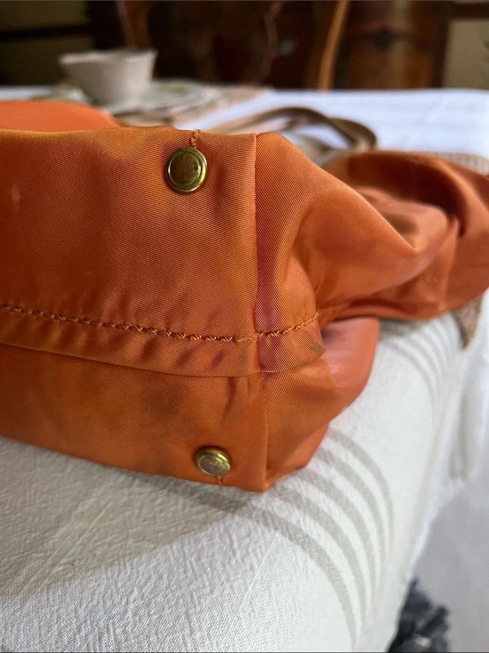 Tumi Orange Nylon Tote with Tan Leather Handles. Pre owned.